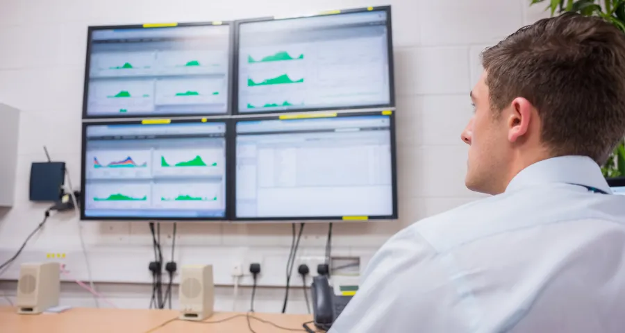 Man monitoring dashboard