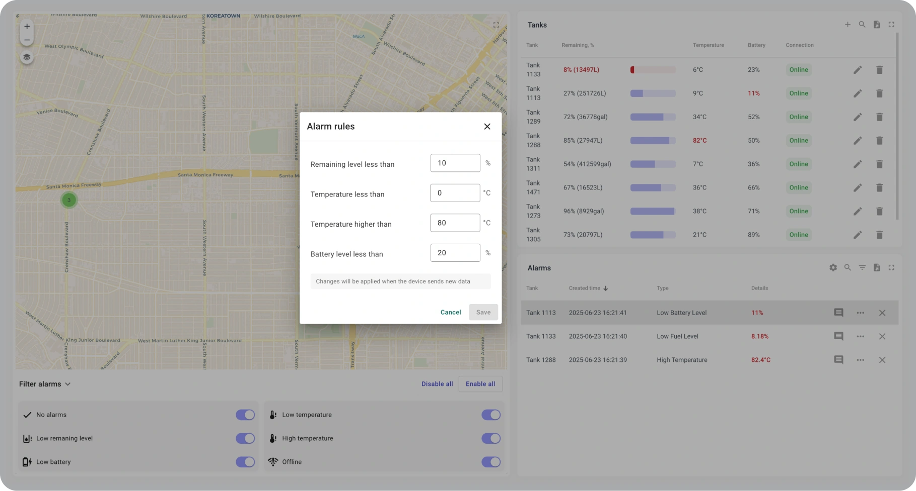 Dialog for setting alarm thresholds for tank monitoring, including fuel level, temperature, and battery.